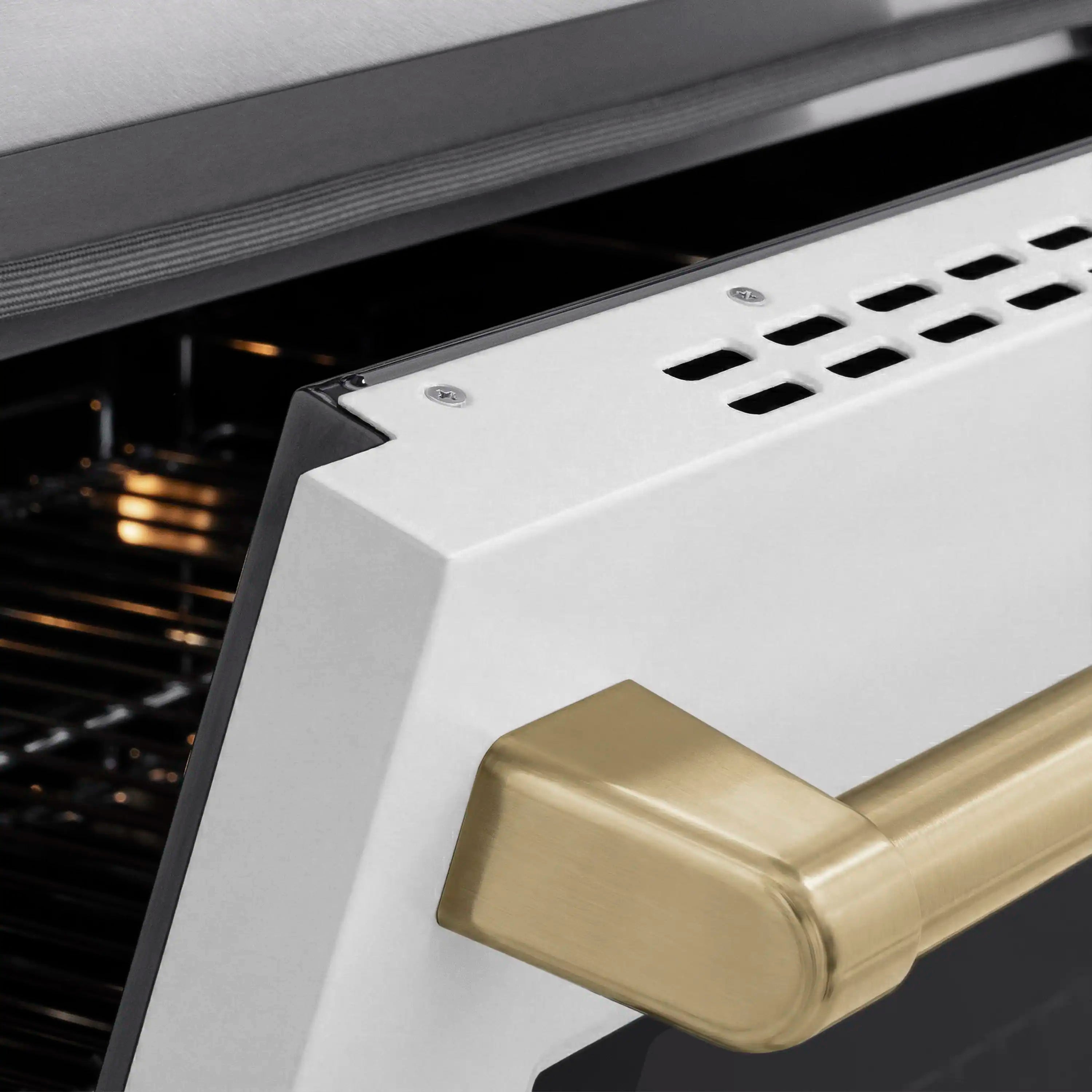 Electric range with champagne bronze handle and vented cooktop edge, stainless steel