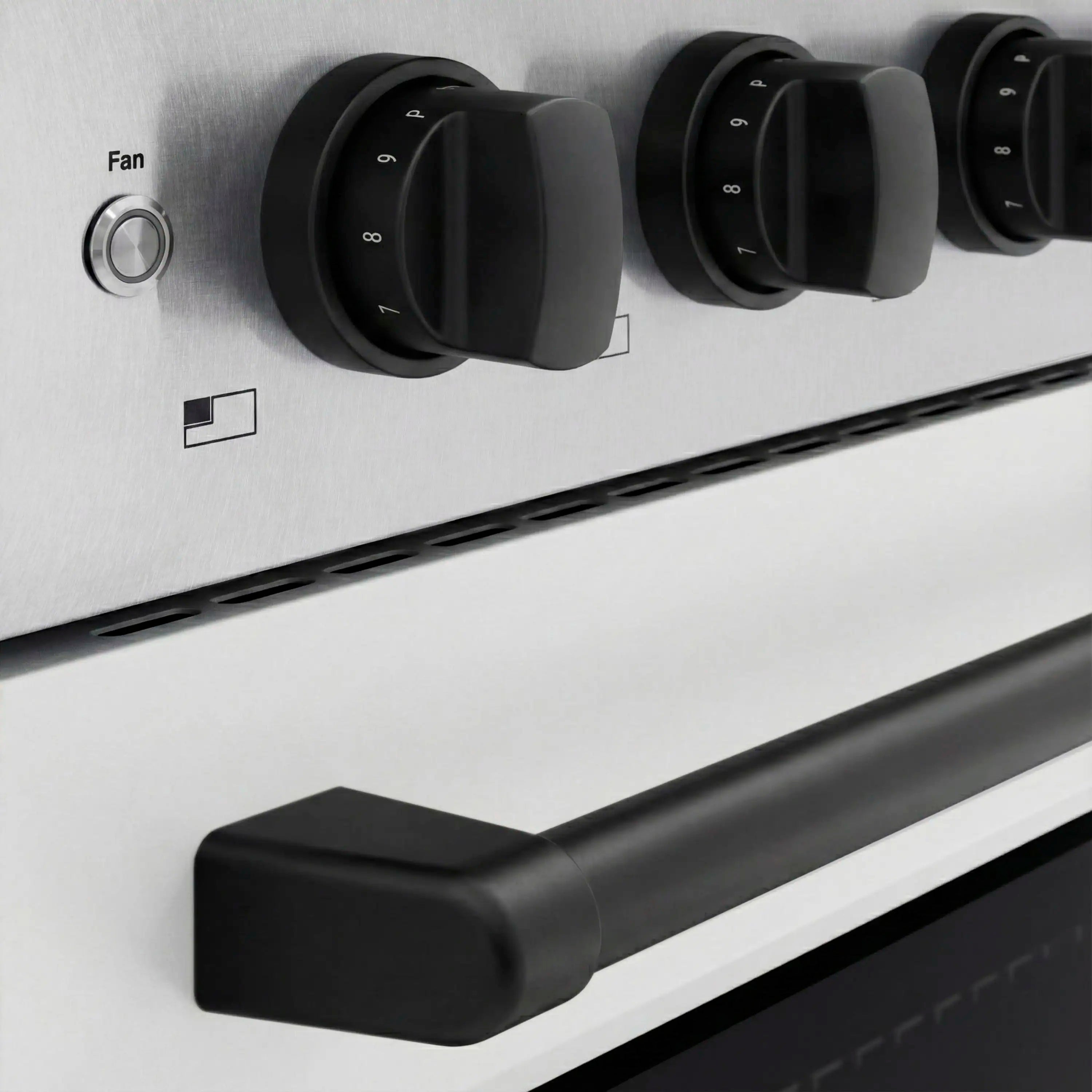 Induction range control area with black multi-function knobs and fan switch