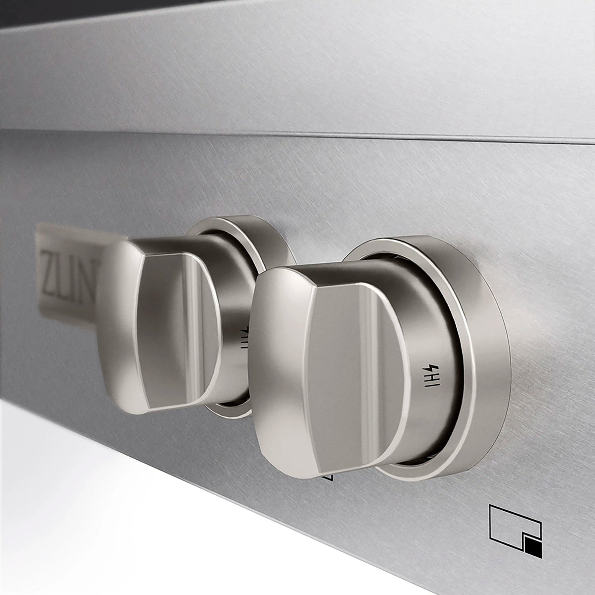Stainless steel gas cooktop control knob detail near ZLINE logo