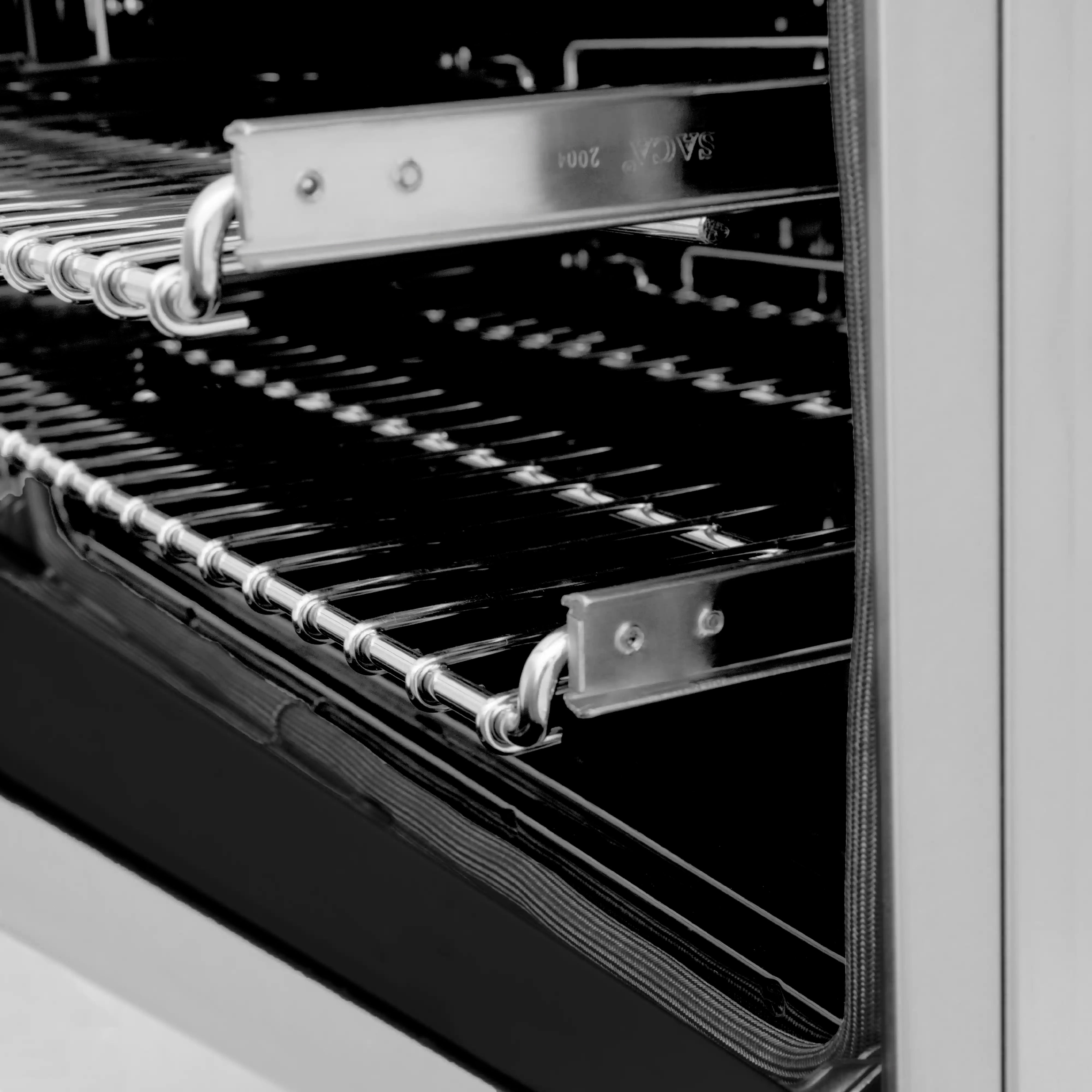 Close-up of oven interior heating elements and racks