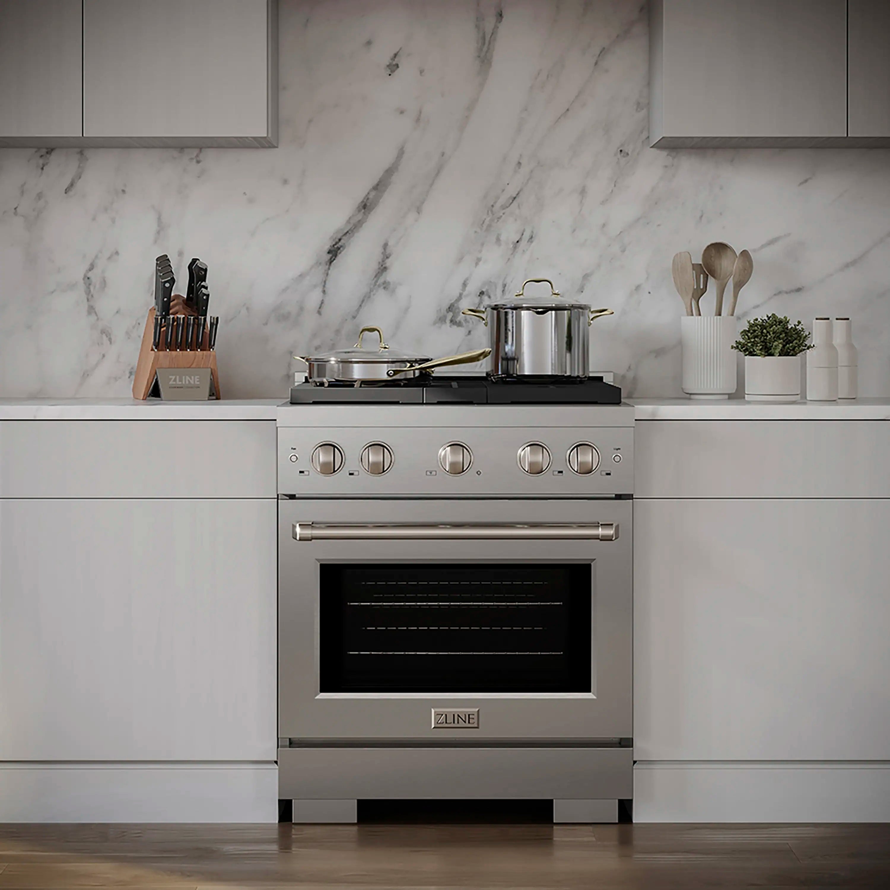 Stainless steel range with front oven door, cooktop burners, and control knobs