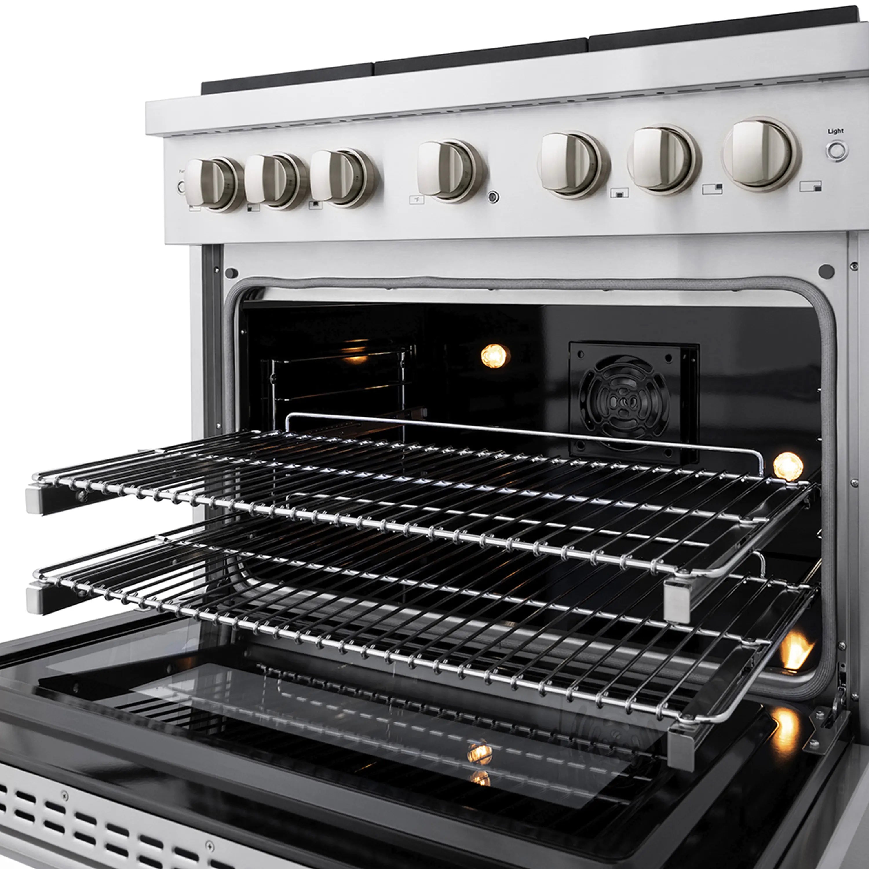 Dual fuel range oven with heating lights, racks, and front control knobs