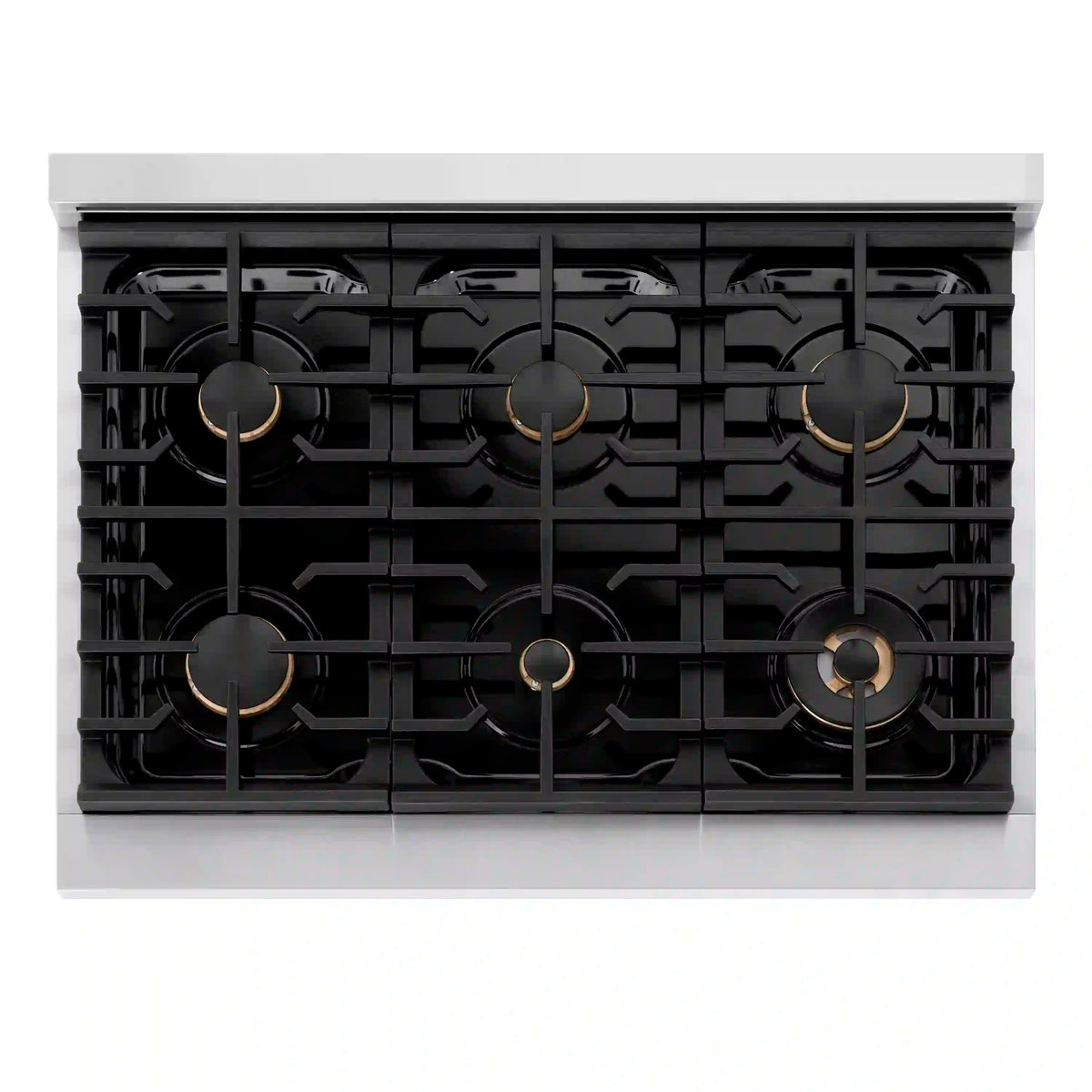 Dual fuel range cooktop with black burner grates and centered gold burner caps