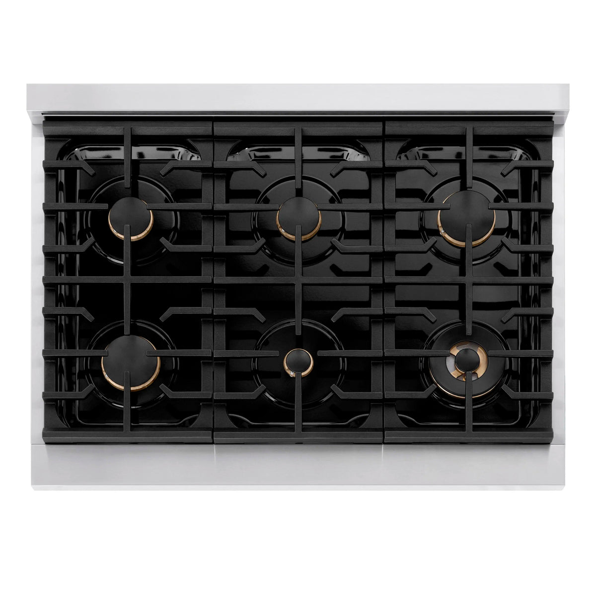 Dual fuel range burner grates with black cast-iron style supports and gold centers
