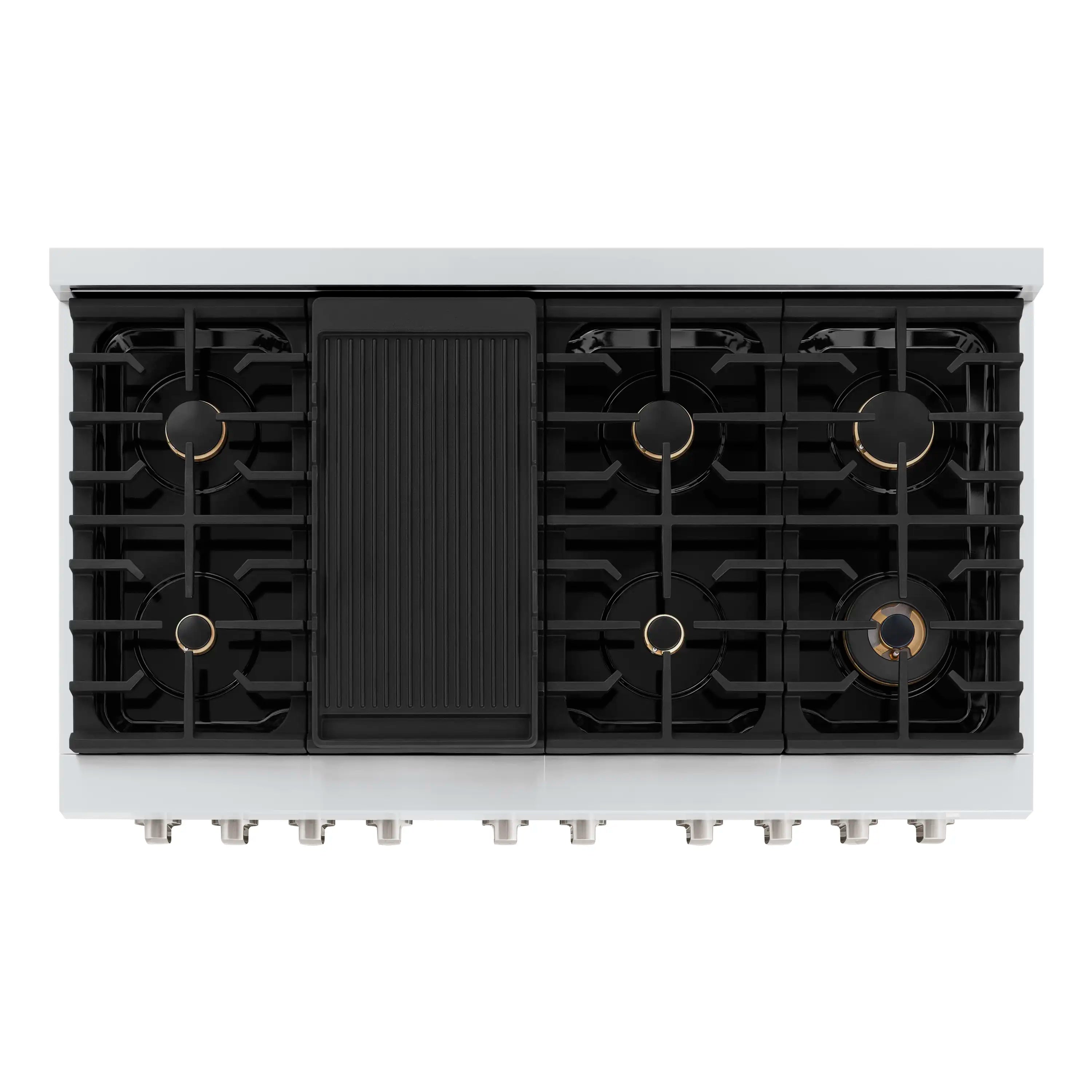 Rear view of cooktop burners with black grates and brass-tipped burner caps on stainless.