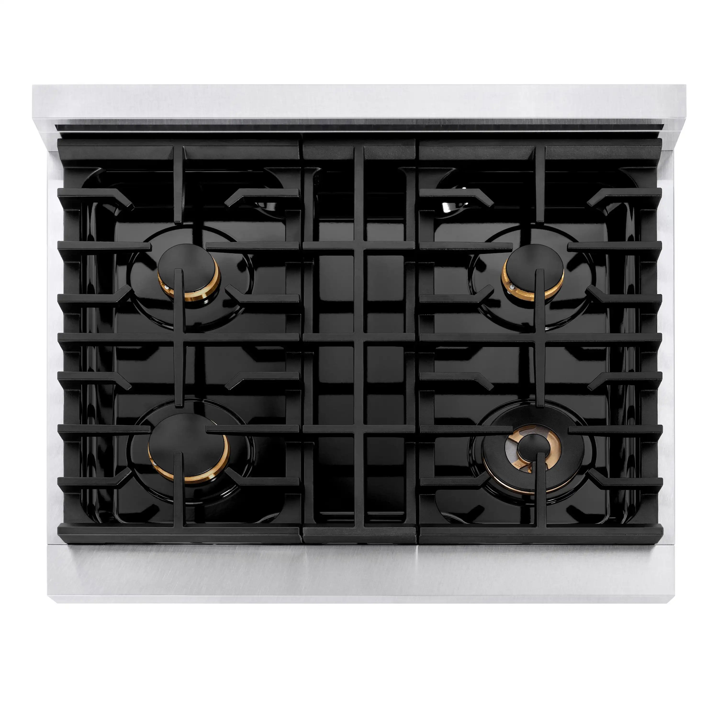 Four-burner gas cooktop with black grates and brass-colored burner caps