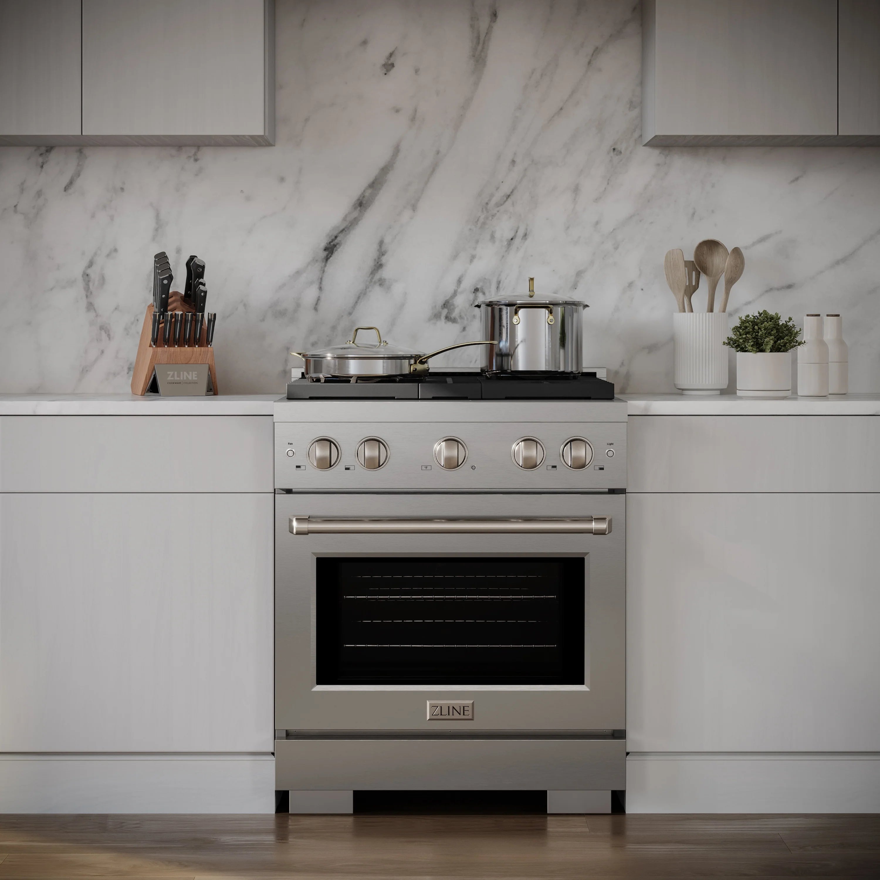 Stainless steel gas range with knobs and oven door in modern kitchen