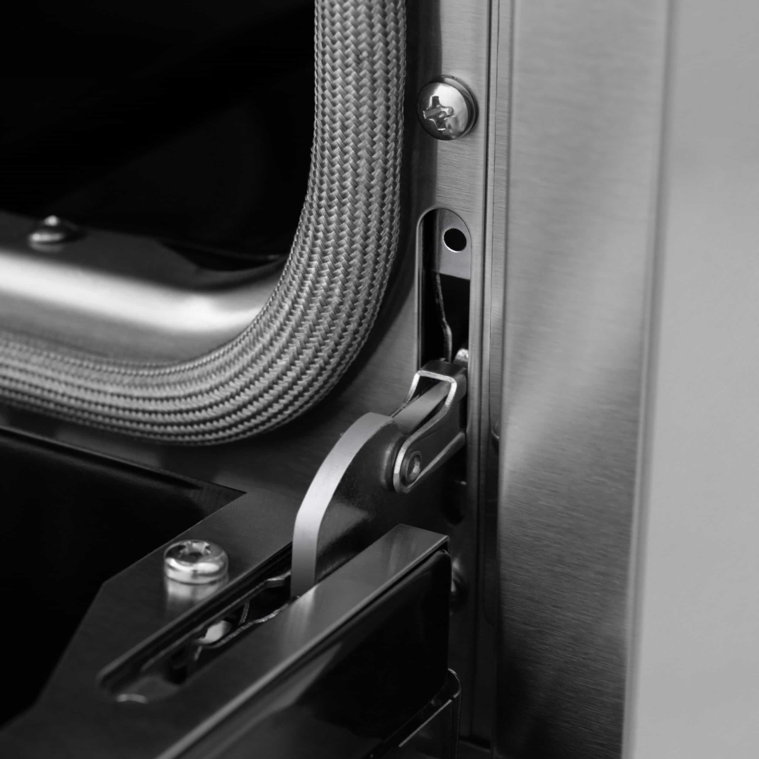 Stainless range side panel with metal latch and braided connector hose