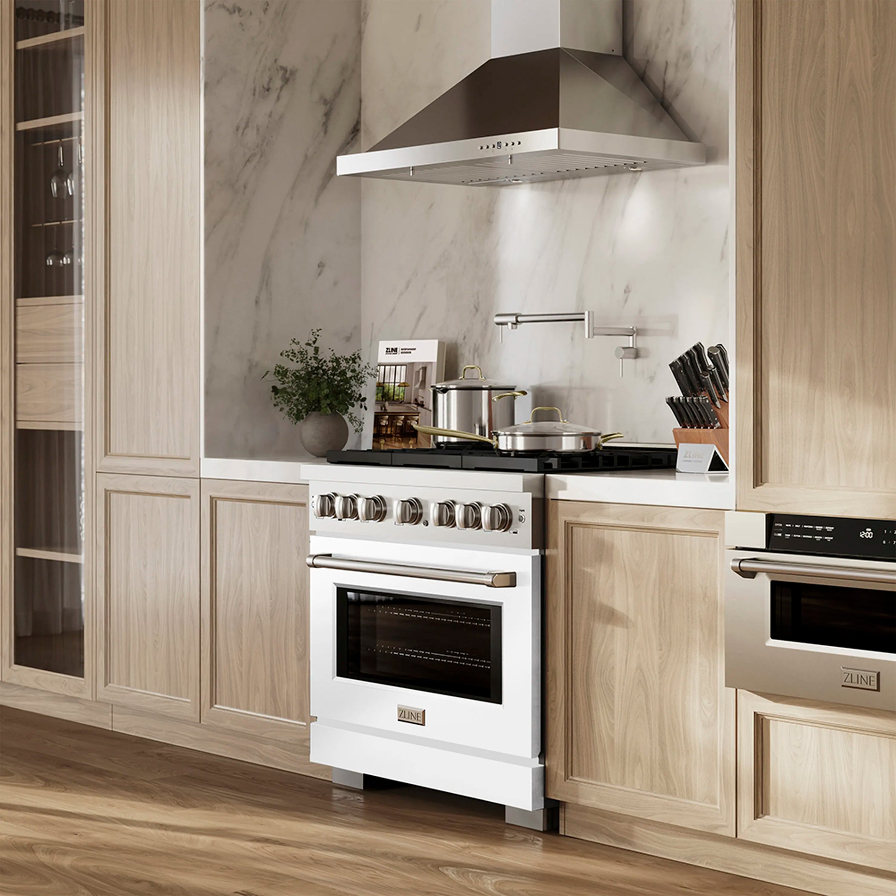 White gas range with cooktop burners and oven door in modern kitchen