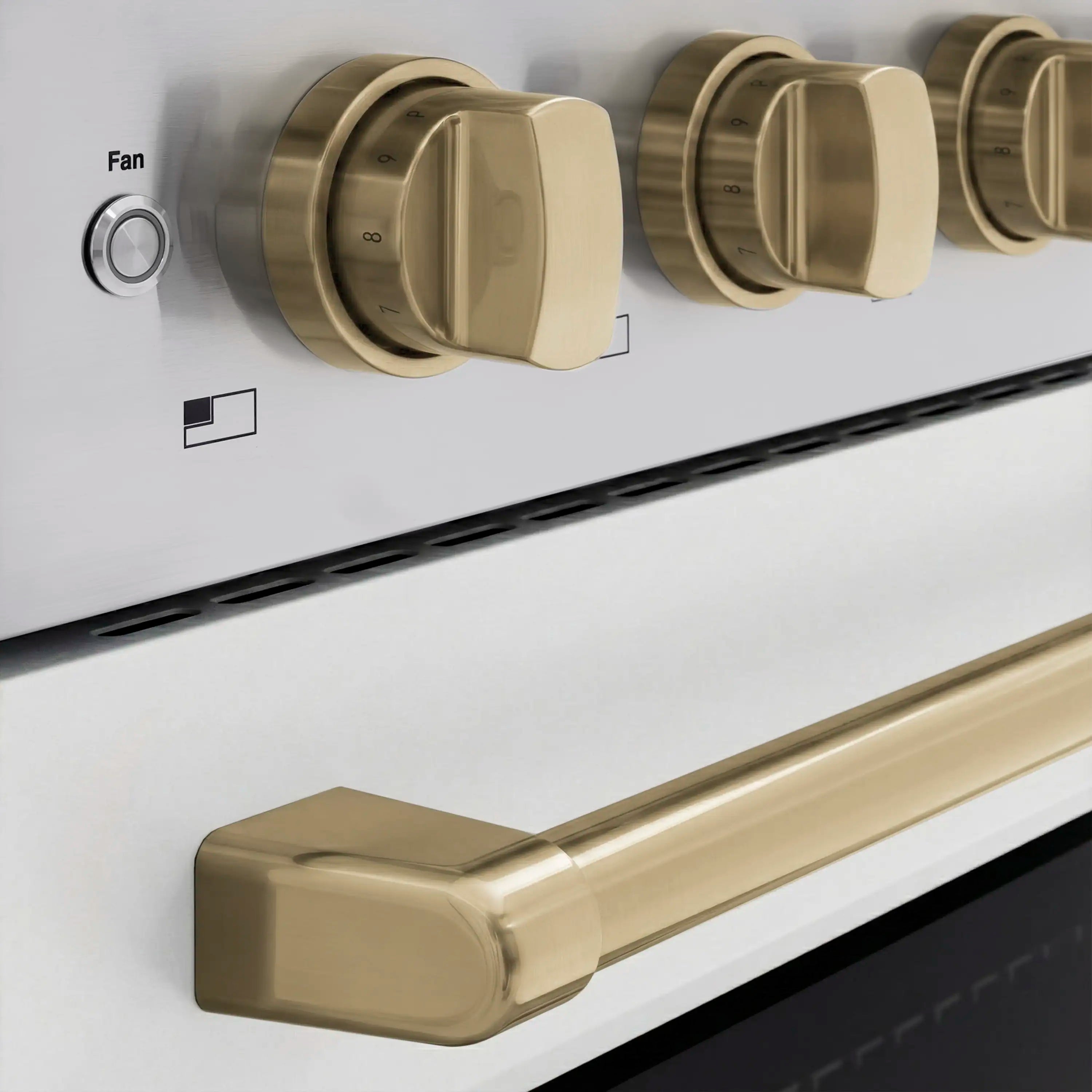 White control panel with champagne bronze cooking knobs and fan selector