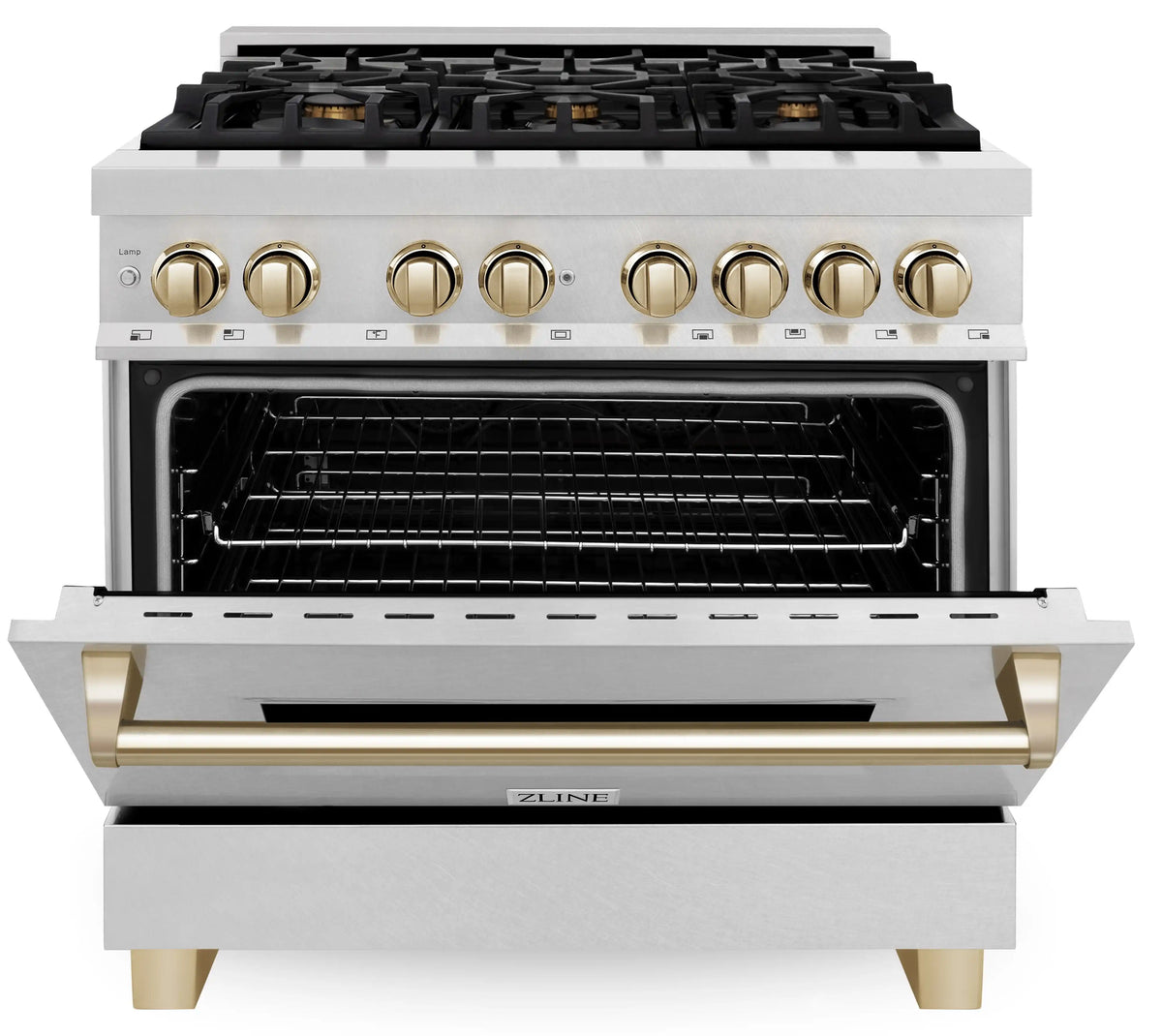 Dual fuel range with black cooktop, gold knobs, and open electric oven with racks