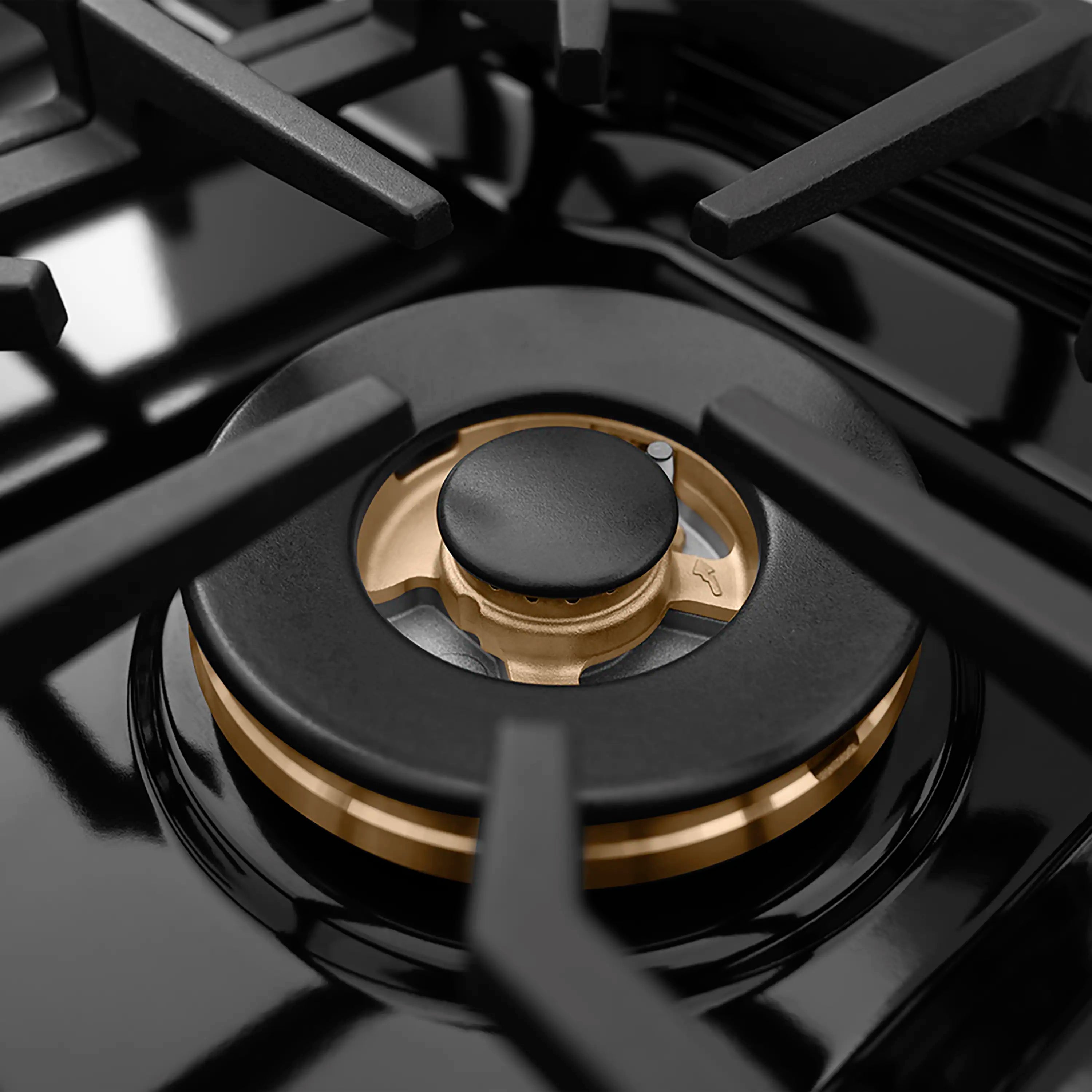 Single gas burner with matte black knob cap and champagne bronze ring