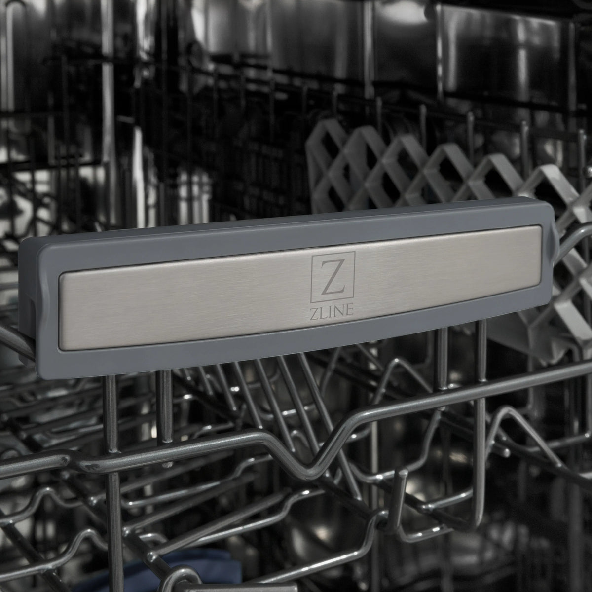Dishwasher control panel area with ZLINE logo and polished gold handle