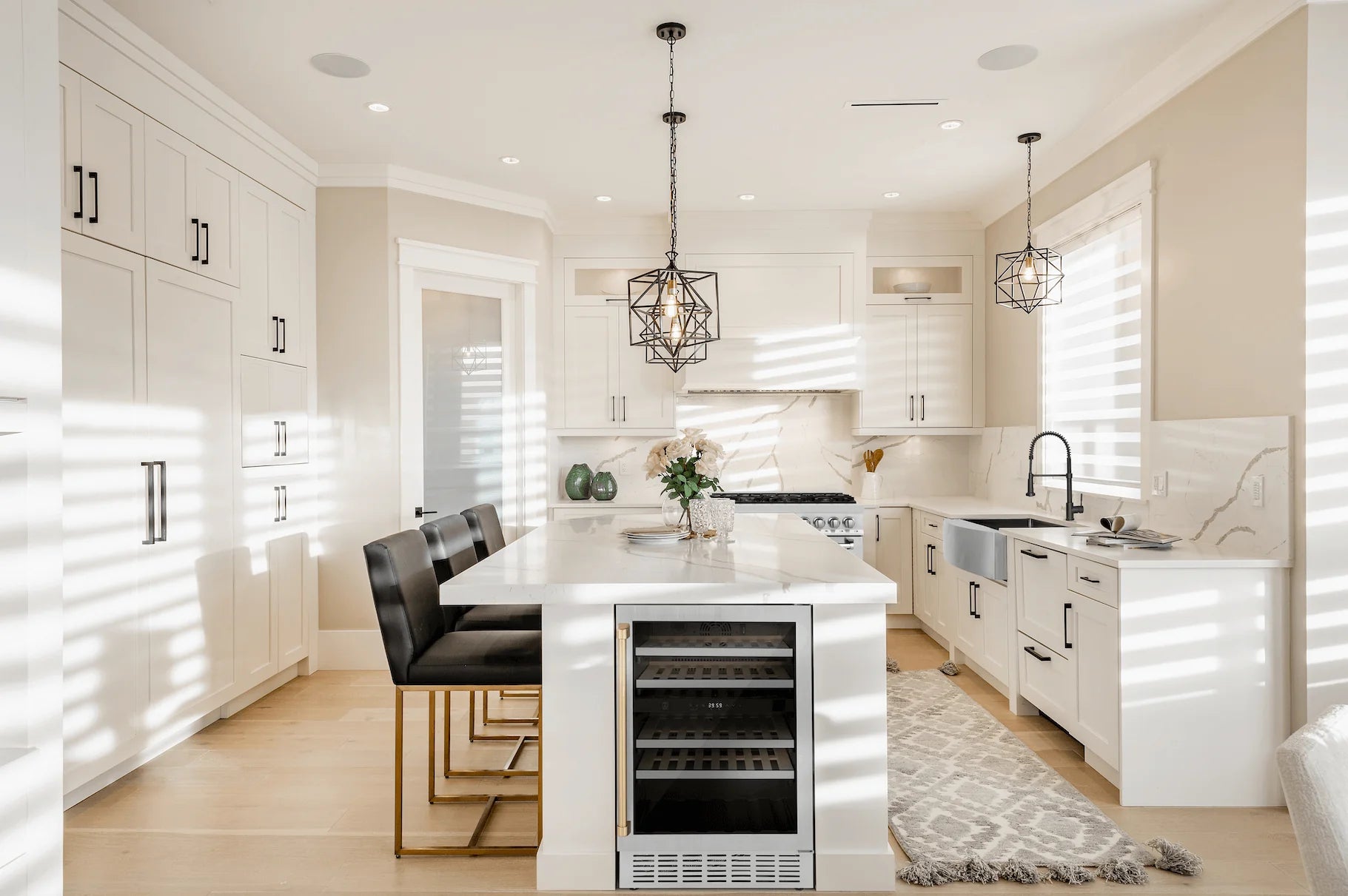 Built-in stainless steel dual-zone wine cooler in a modern kitchen