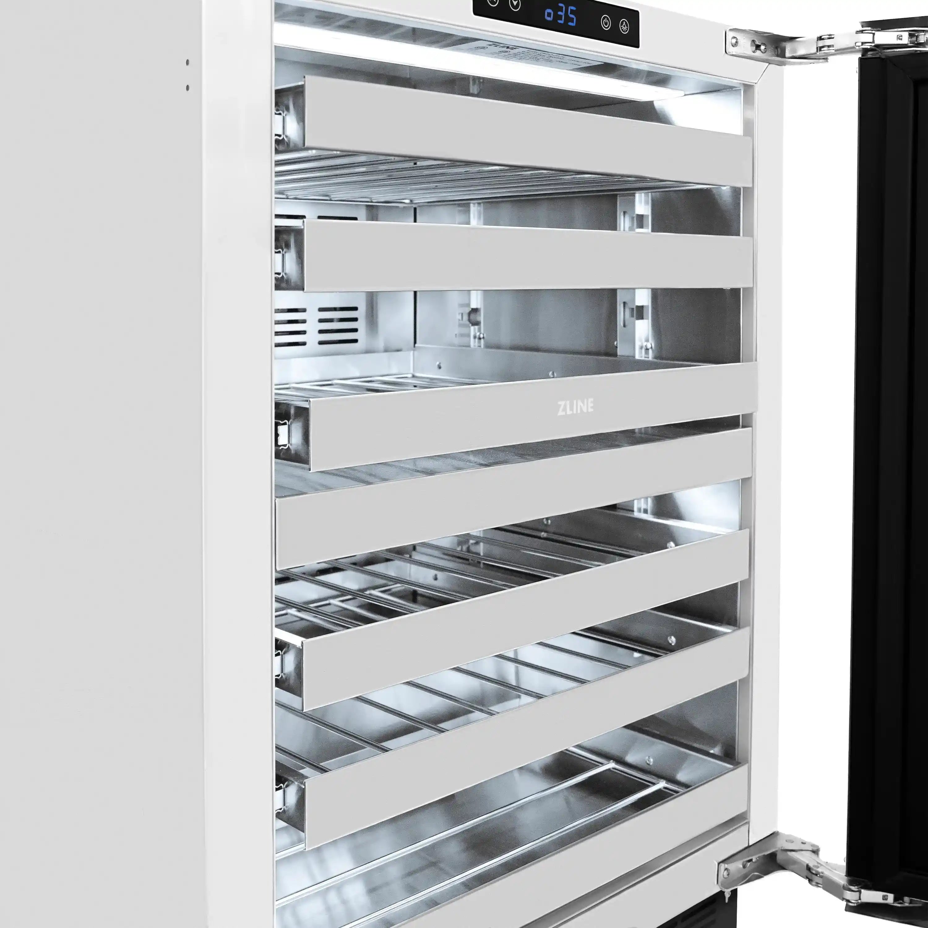 Wine cooler with glass door open, showing metal slide-out racks and empty bottle spaces
