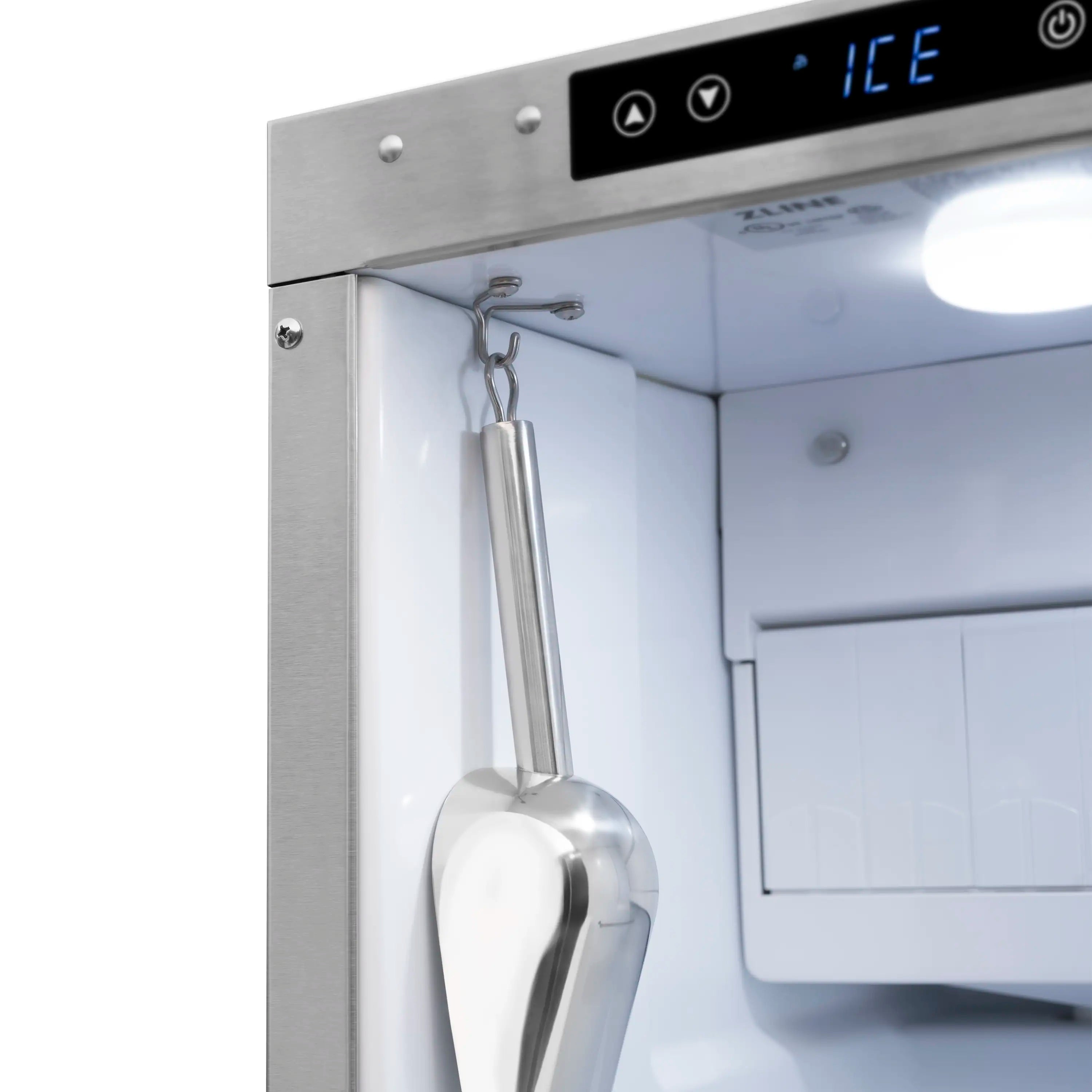 Countertop ice maker with stainless dispenser scoop and blue ICE control display