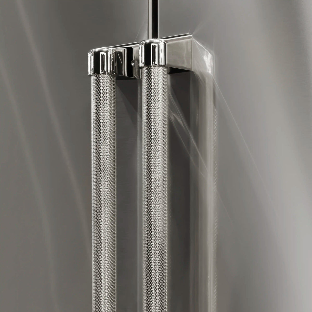 Perforated stainless refrigerator handle with glossy chrome end caps
