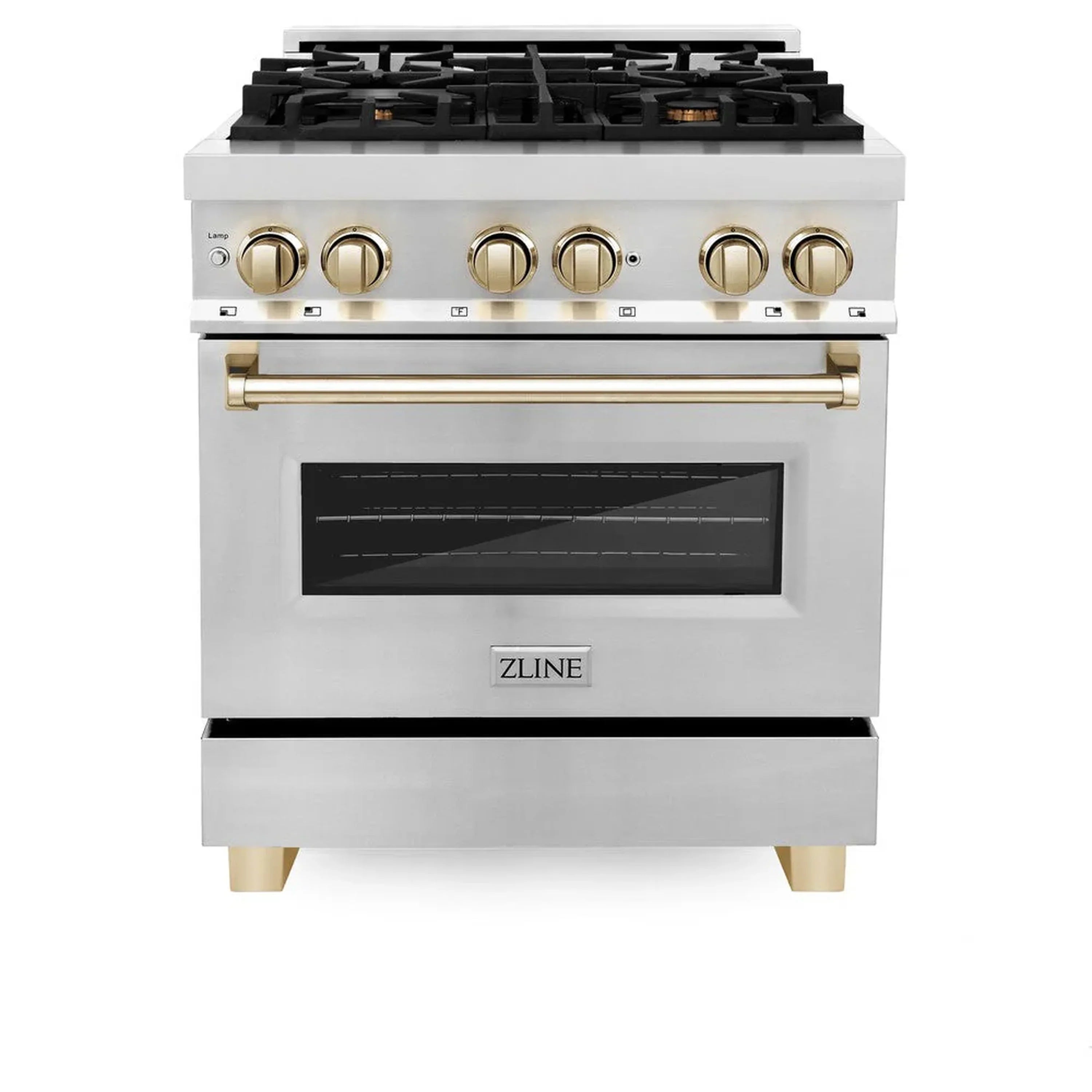White dual fuel range with black cooktop grates and gold control knobs