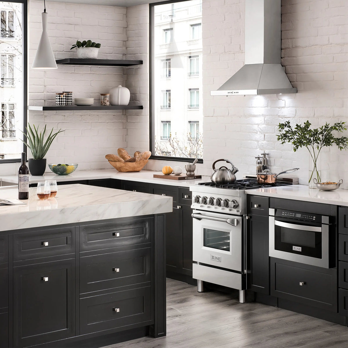 Stainless steel wall mount range hood above stove, chimney with flared canopy