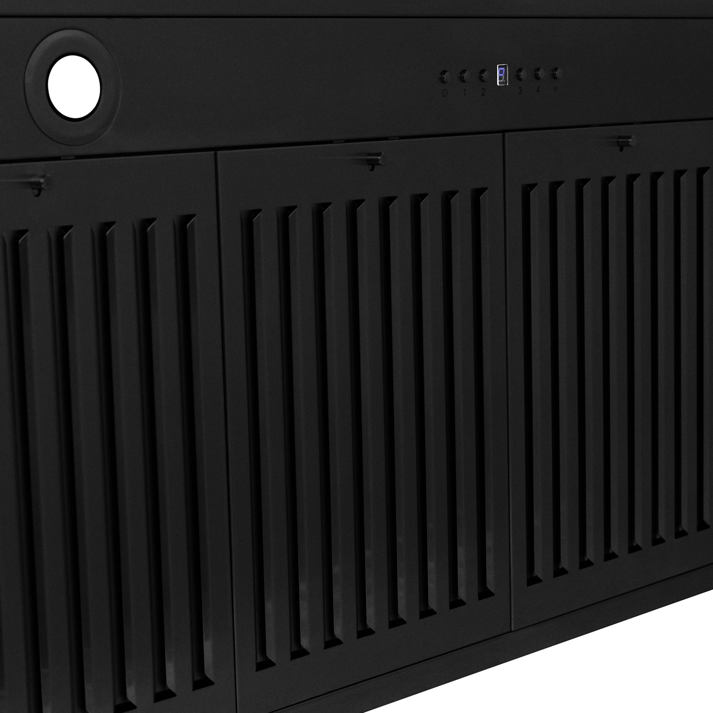 Black range hood underside with vertical vent grille and control panel