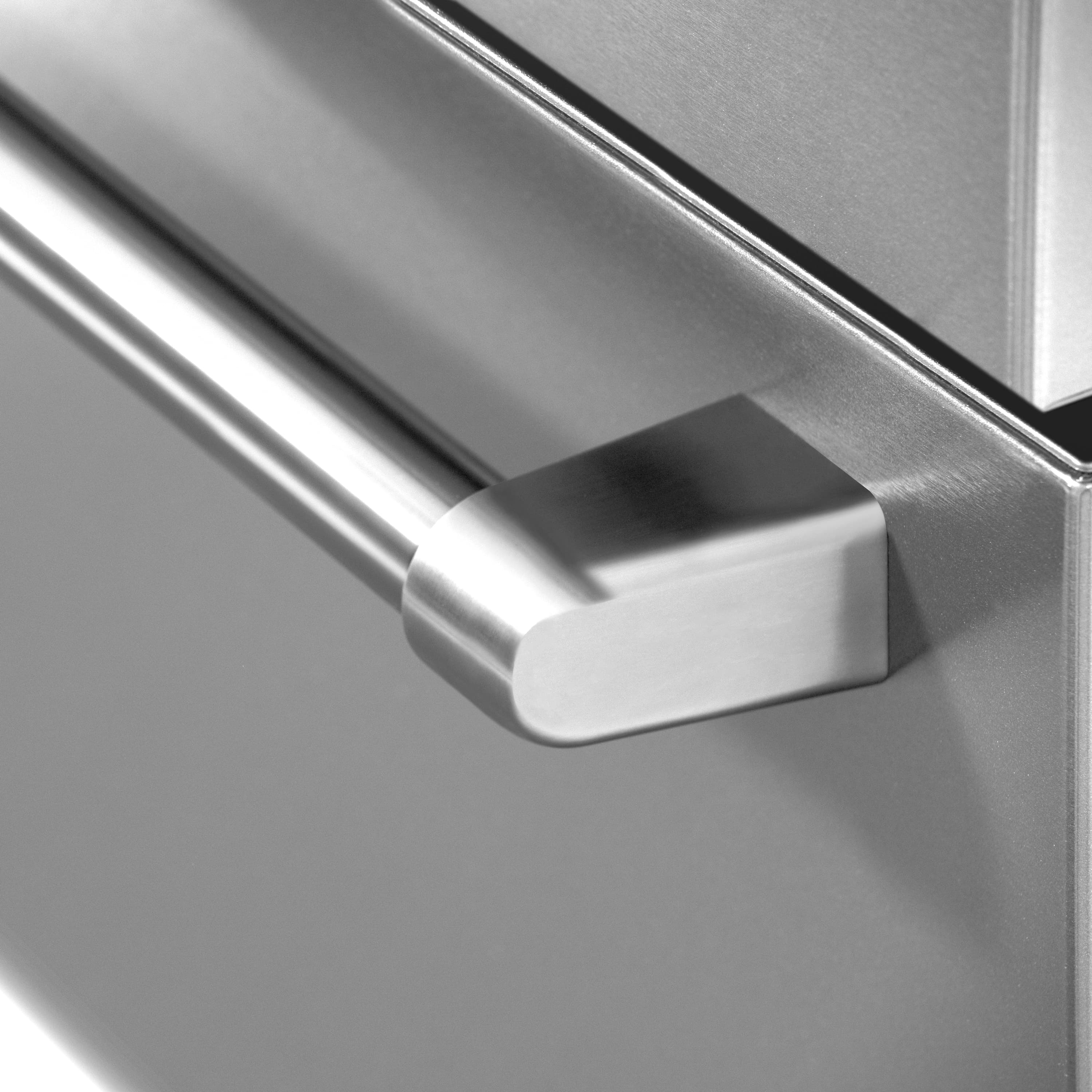 Stainless steel refrigerator handle detail on the freezer door