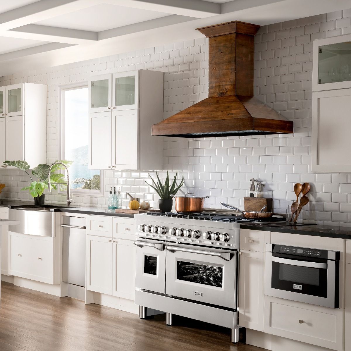 Stainless steel dual fuel range with gas cooktop and two ovens with viewing windows