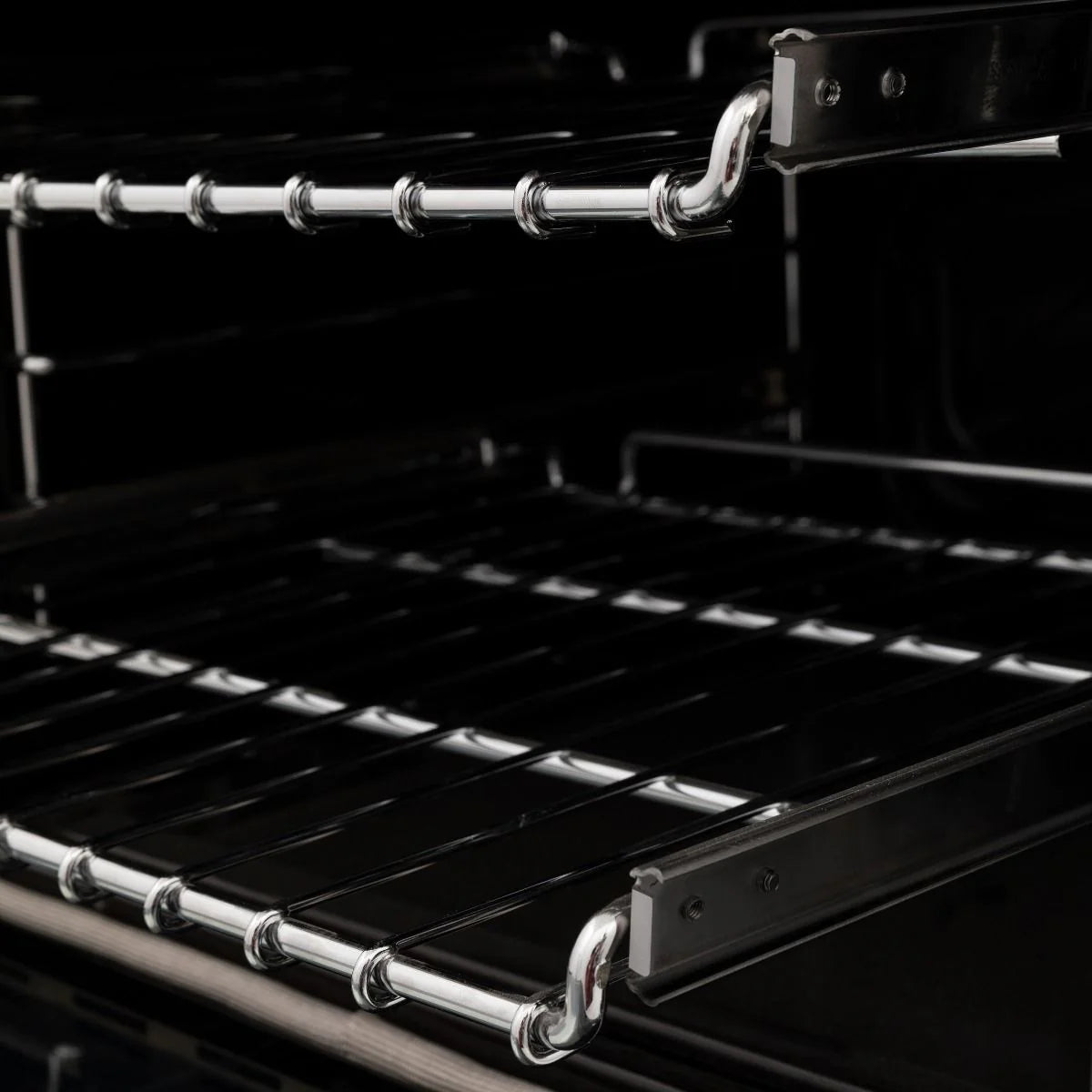 Stainless steel dual fuel range cooktop grates with burner controls