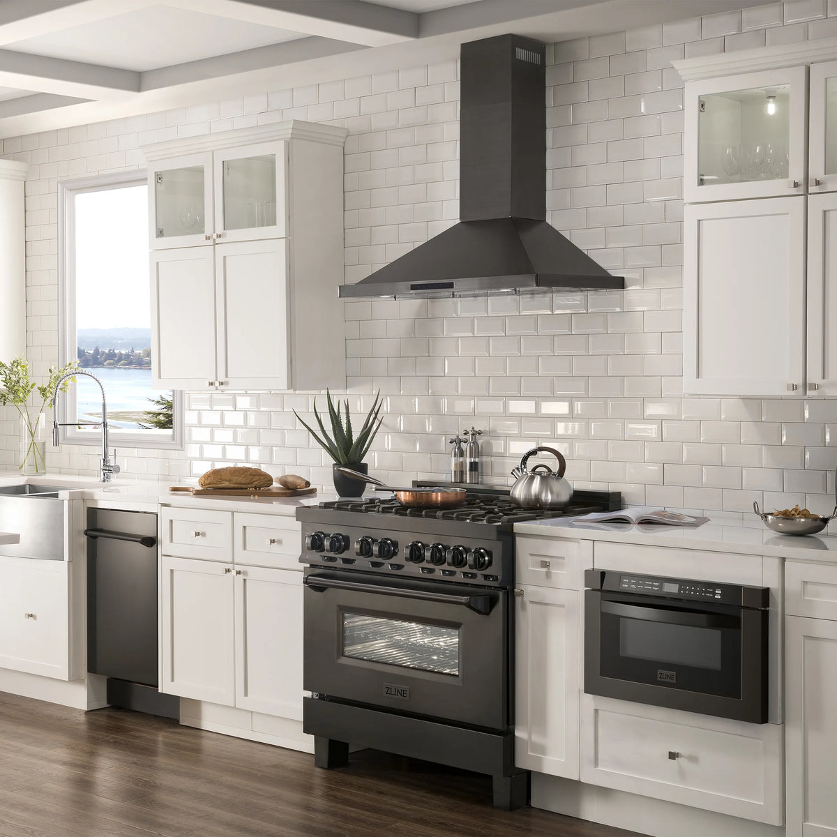 ZLINE 36-inch black stainless steel wall mount range hood, installed in a kitchen
