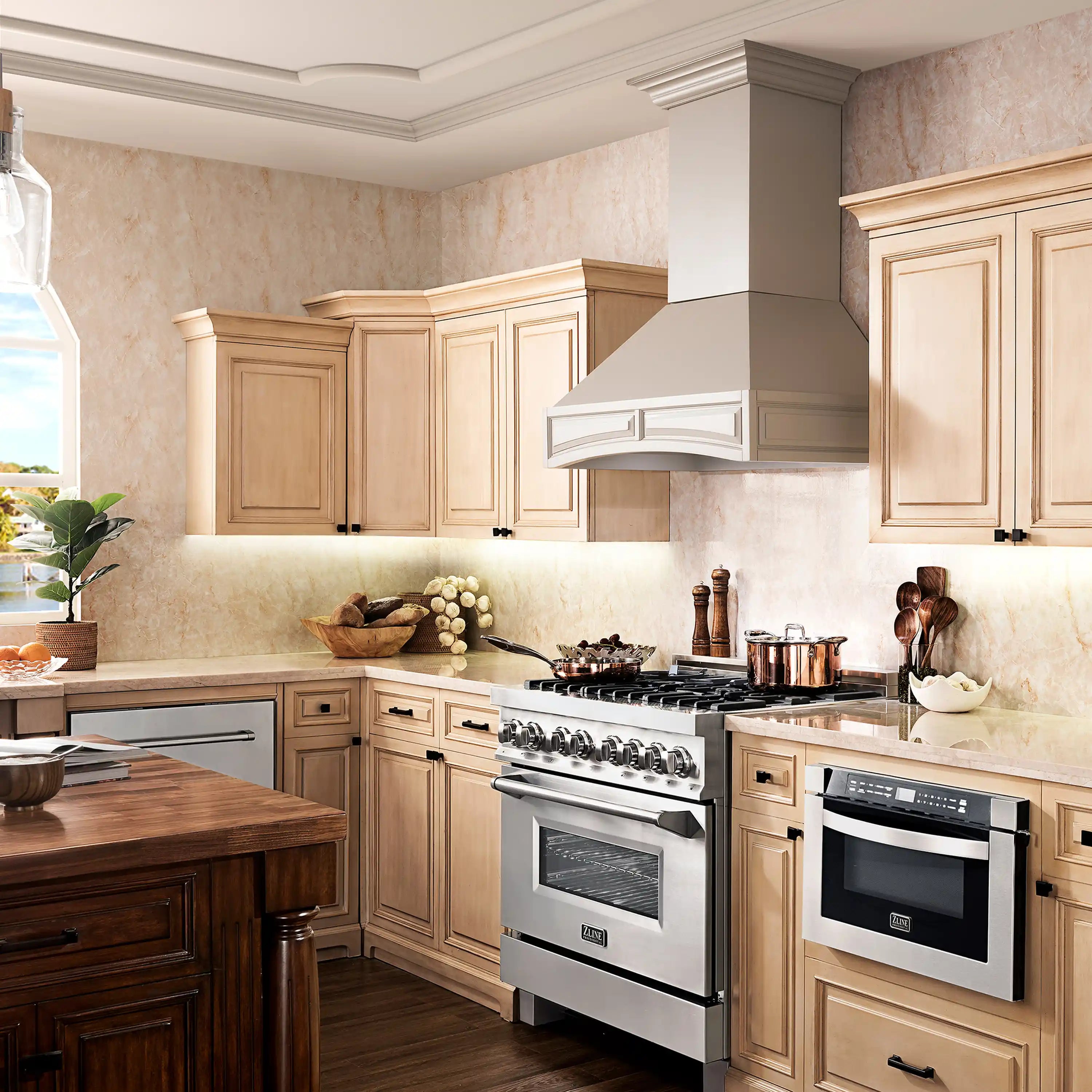 White wall-mount chimney range hood over cooking range in wooden cabinets
