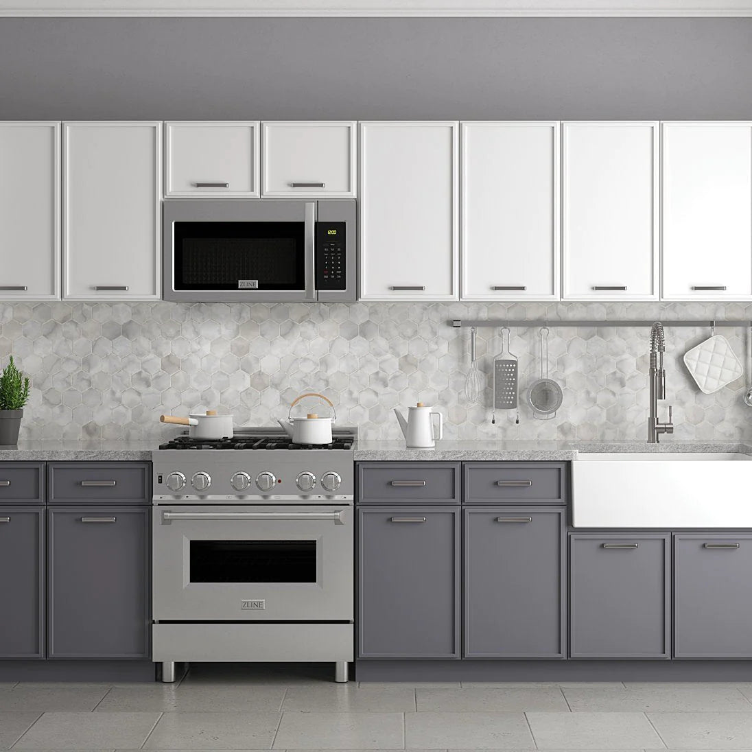Kitchen appliance set featuring stainless gas range and over-the-range microwave