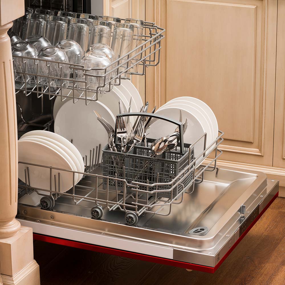 Built-in dishwasher open with dishes and cutlery rack, red lower trim