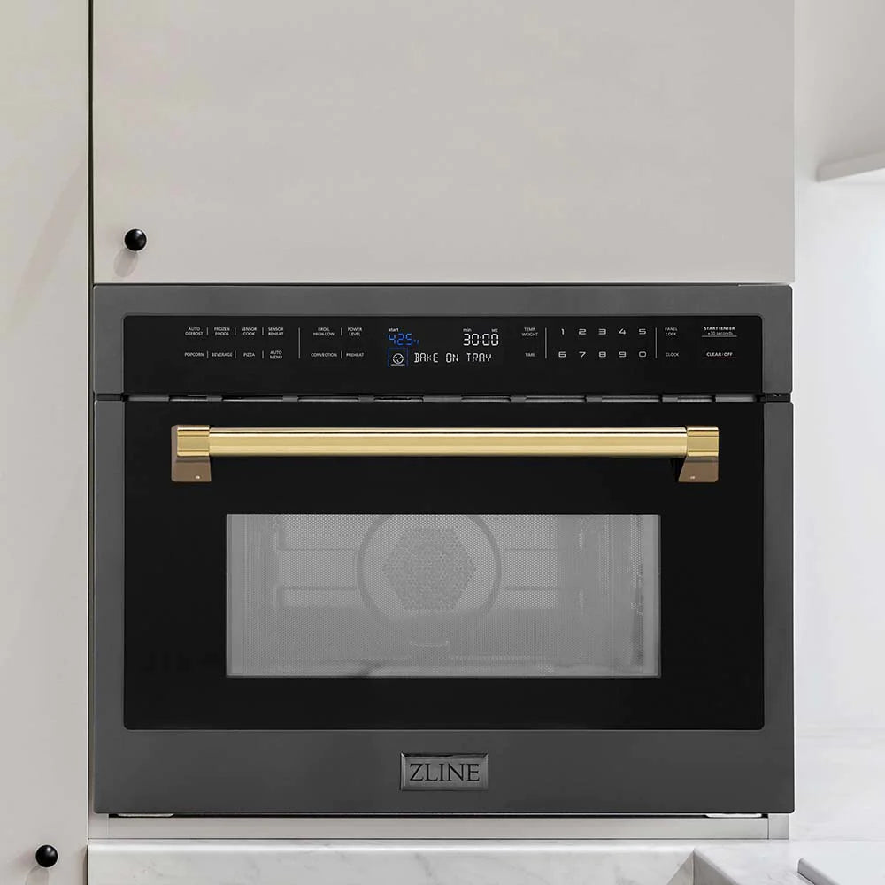 Black stainless built-in convection microwave with gold handle accents and clear glass door