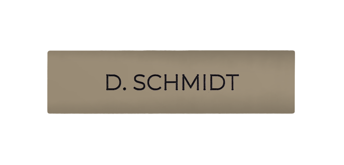 Beige engraved nameplate with text "D. SCHMIDT"