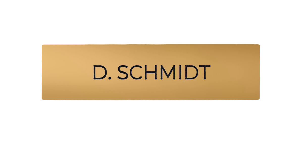 Saffron yellow engraved nameplate with “D. SCHMIDT” text