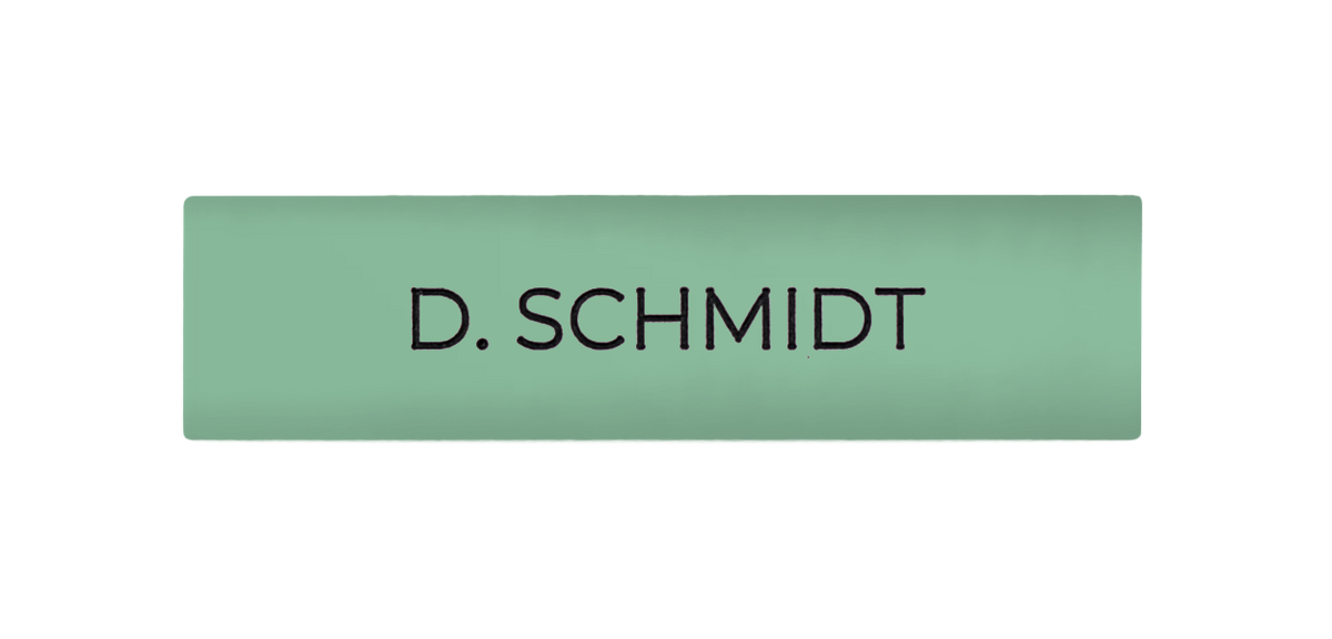 Pastel green engraved nameplate reading 'D. SCHMIDT'
