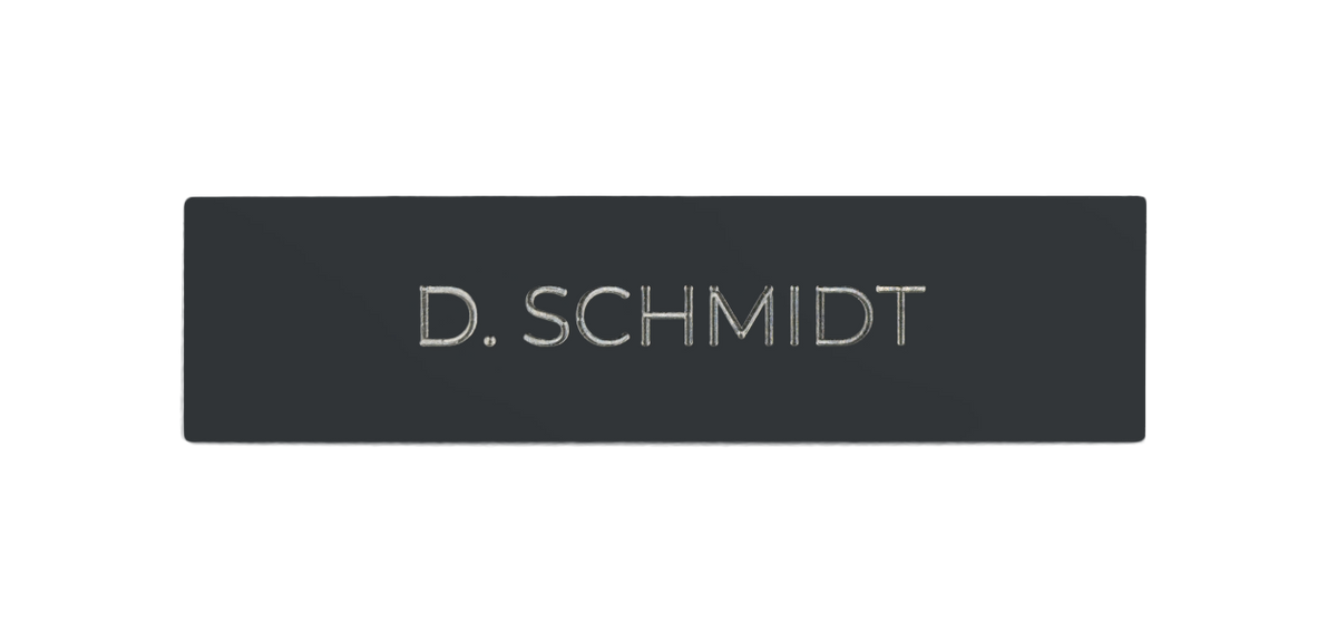 Slate grey doorbell nameplate with engraved “D.SCHMIDT”