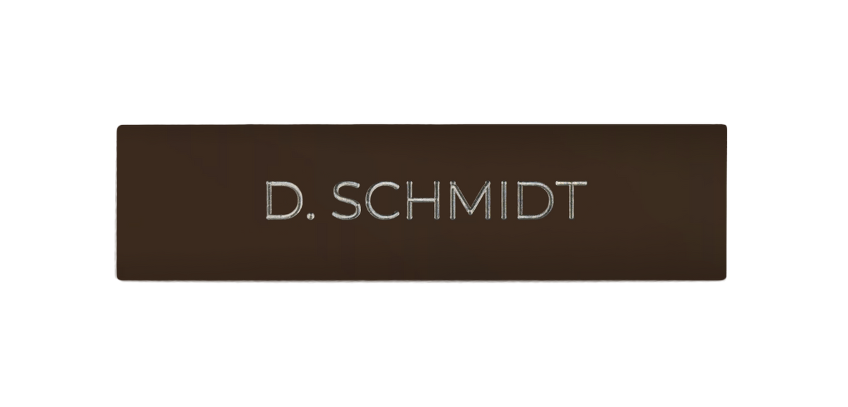 Terra brown nameplate with engraved text: D. SCHMIDT