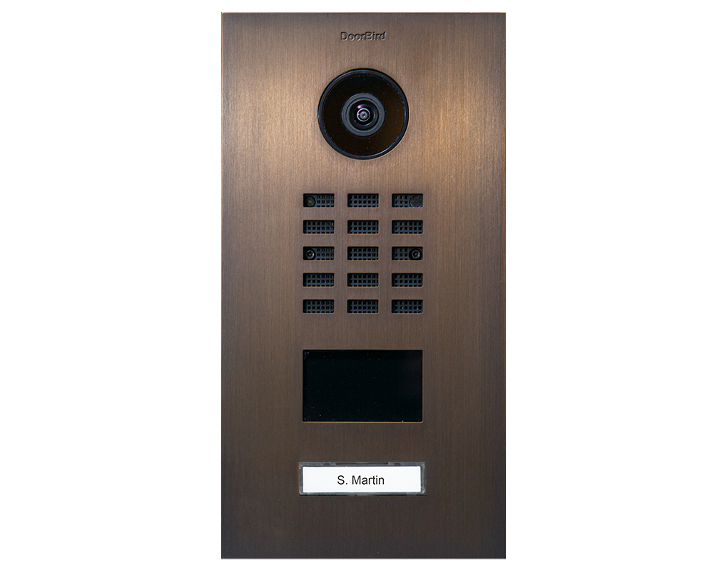 DoorBird bronze IP video door station: camera lens, keypad grid, call button, name label