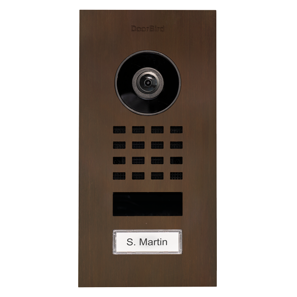 Bronze flush-mount video intercom with camera lens, call button keypad and nameplate