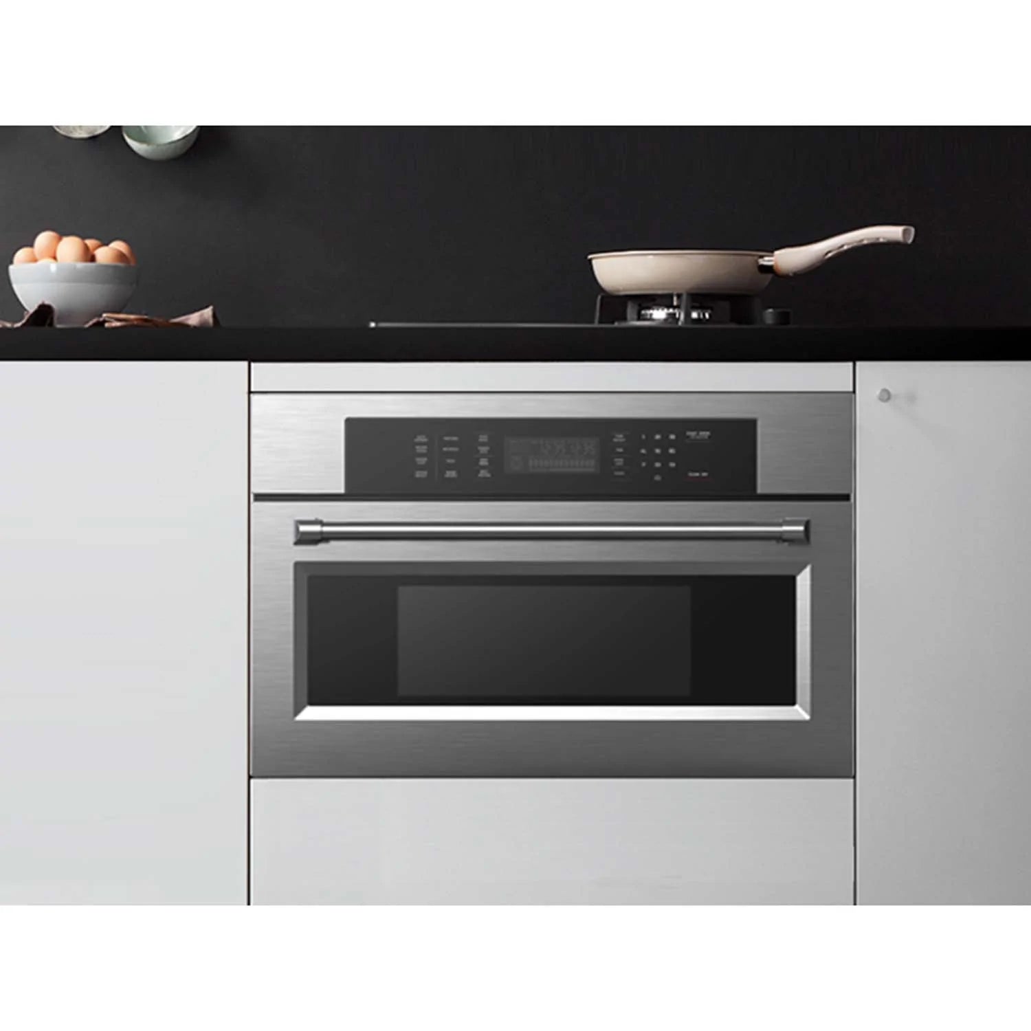 Built-in microwave wall oven with stainless trim, black glass door and control panel