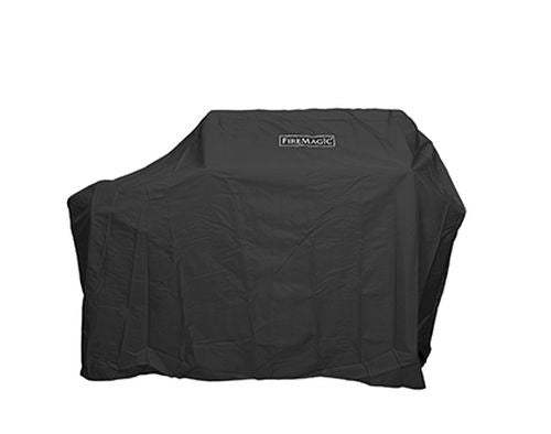 Fire Magic grill cover in dark fabric with front logo