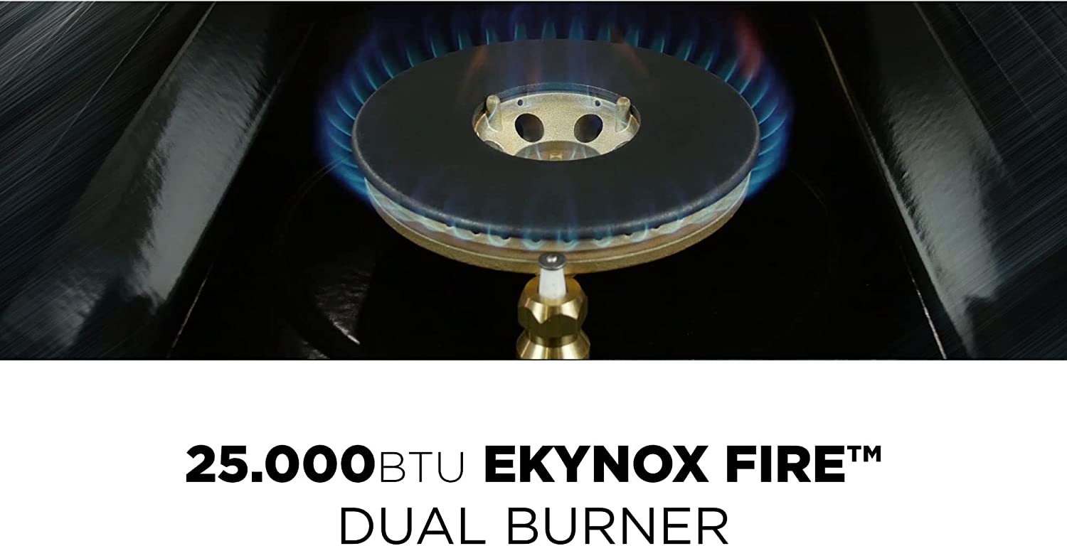Gas burner with dual blue flames under stainless steel cooktop