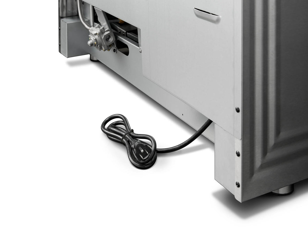Stainless appliance with power cord near bottom edge and outlet