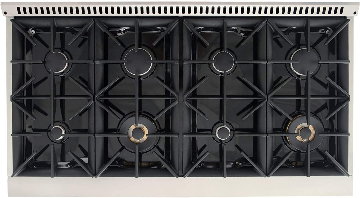 Open gas cooktop with multiple black burner grates and copper-toned burner caps