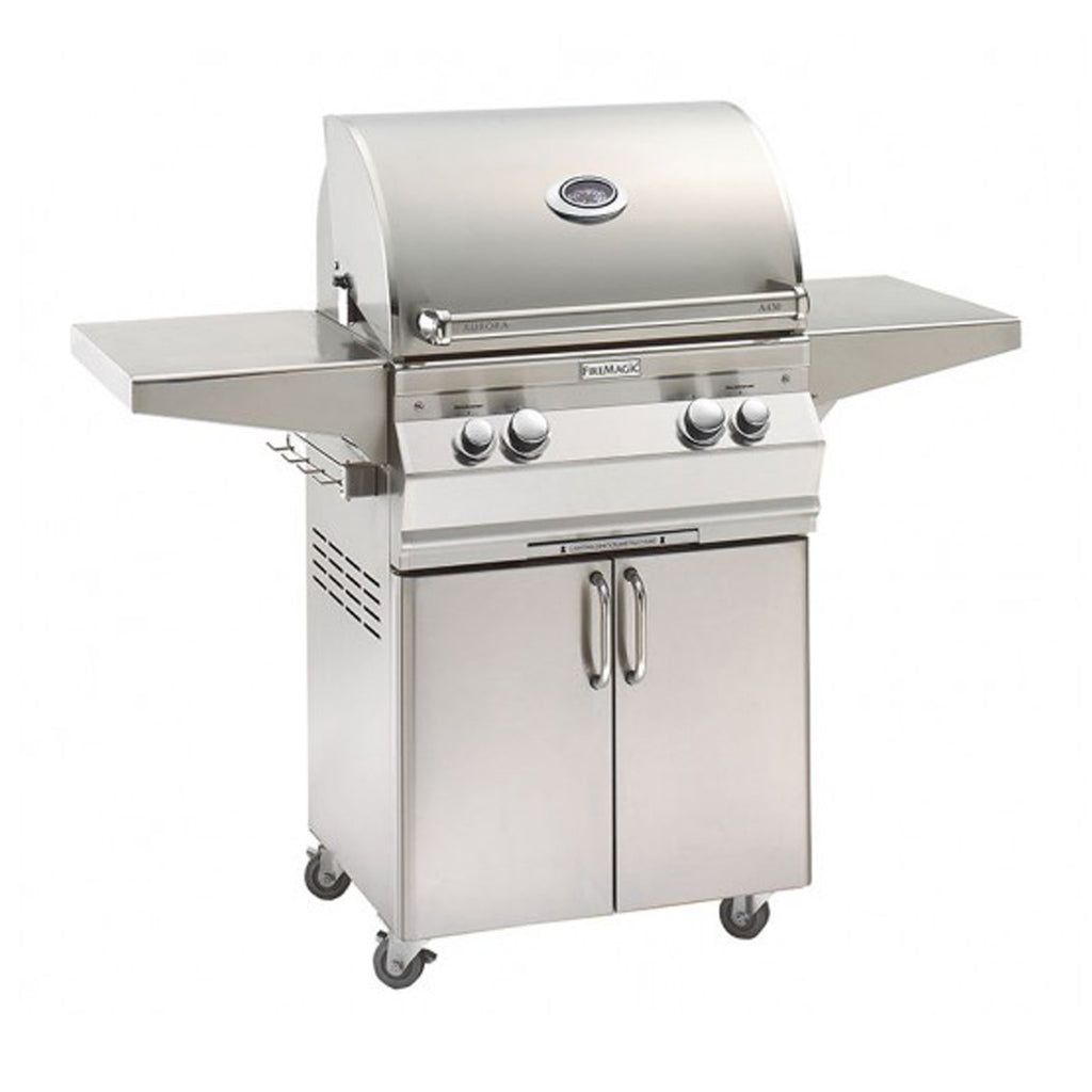 Freestanding stainless steel gas grill with side shelves, double doors, and control knobs