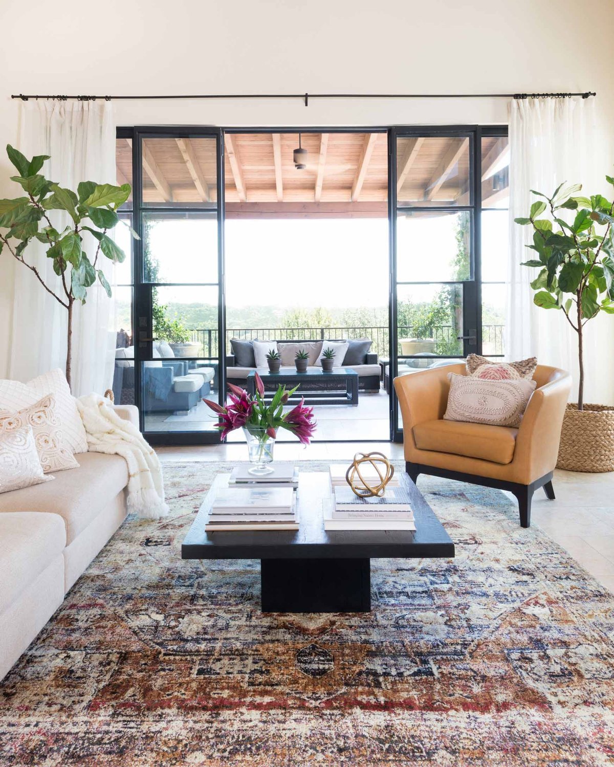 Slate and cream distressed medallion power-loomed rug in living room setting