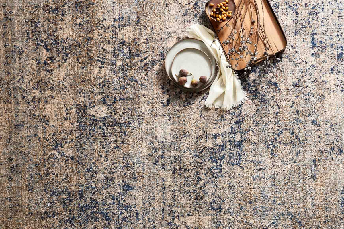 Transitional power-loomed rug, mottled mist and blue texture with abstract motif