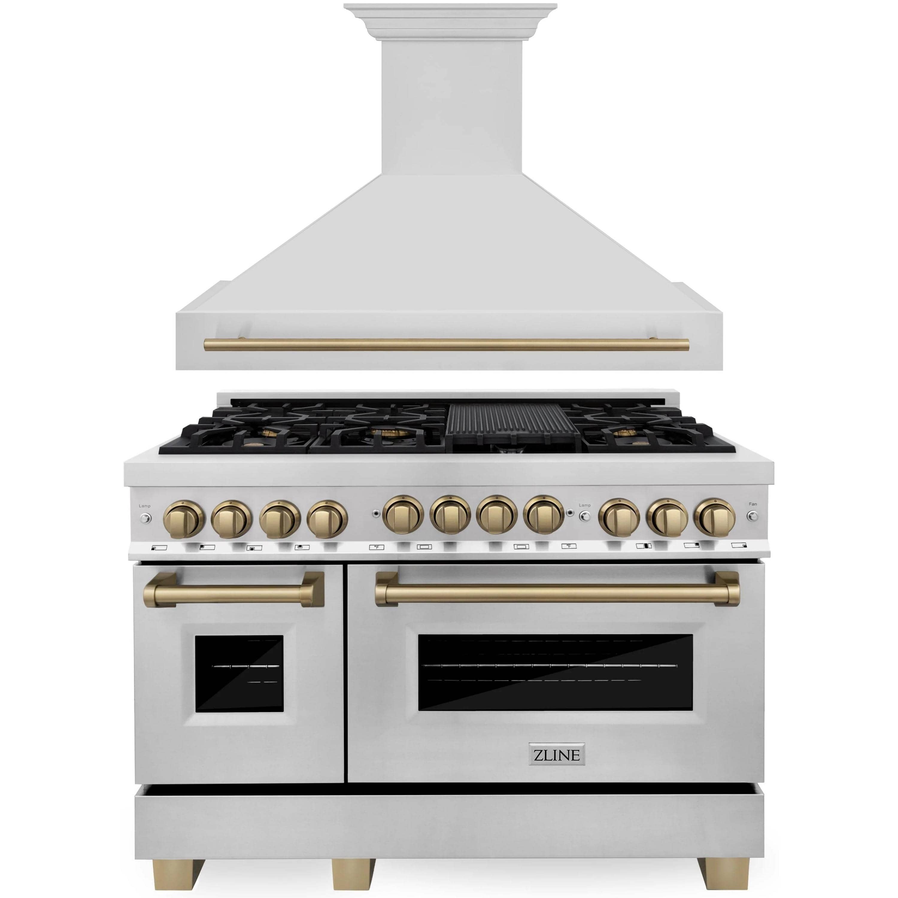 Stainless steel dual fuel range with champagne bronze trim, front view with knobs and ovens