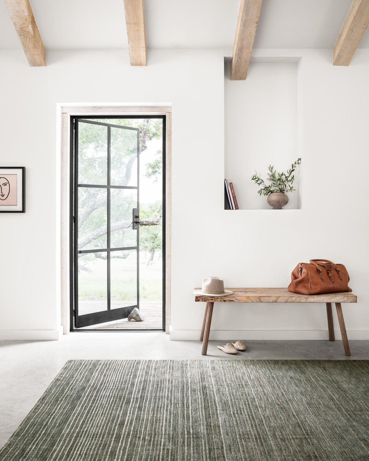 Traditional hand-loomed rug in dark lagoon with thin horizontal stripes