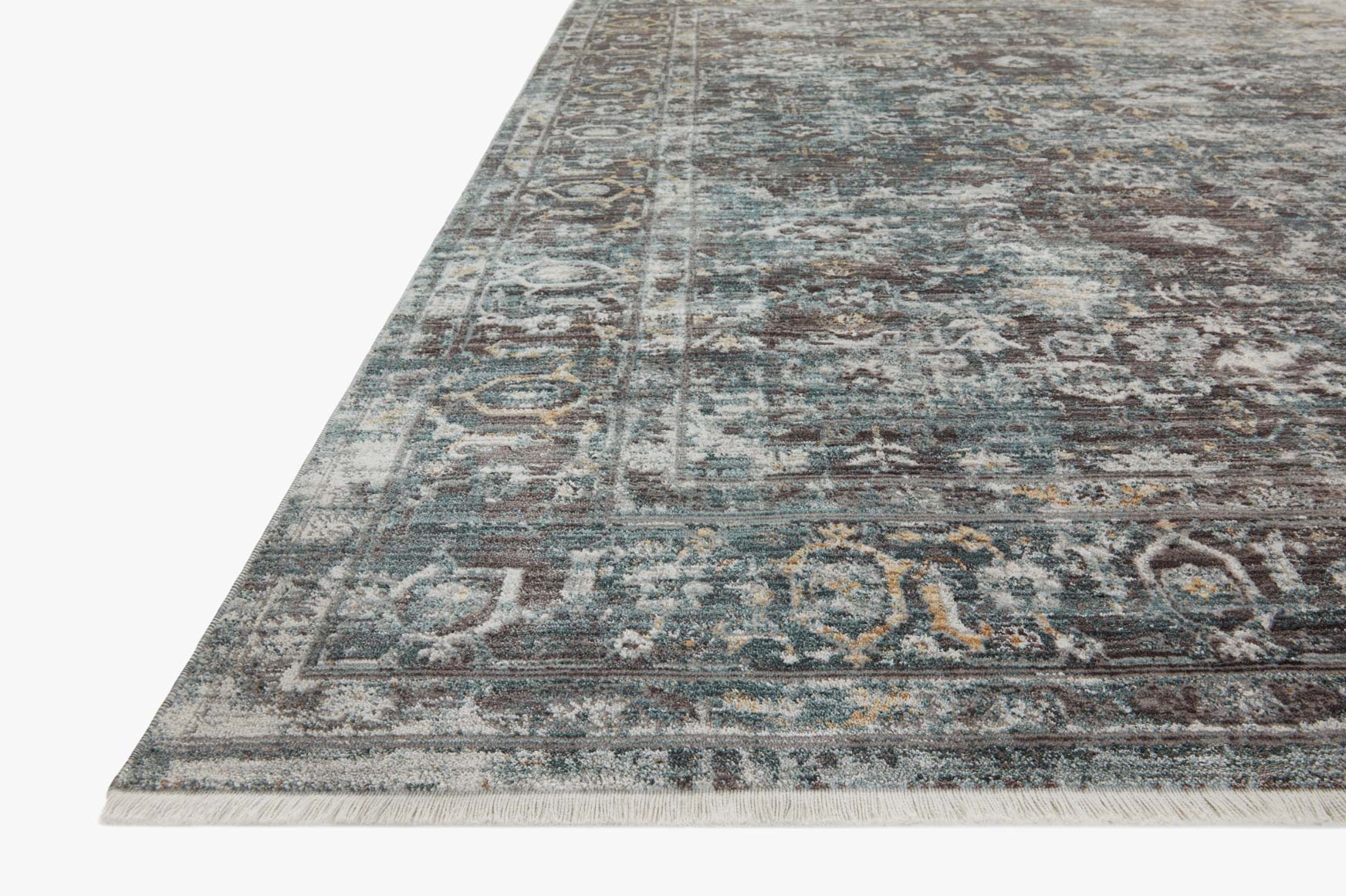Traditional power-loomed area rug in slate gray with teal accents, corner detail